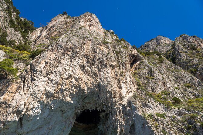 Capri Tour from Pompeii, Vico Equense & Castellammare di Stabia - Capri by boat: Faraglioni, Curzio Malaparte, and the Arch of Love