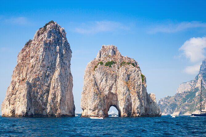 Full Day Capri Tour from Pompeii by Small Ferry Boat - The boat tour around Capri: Faraglioni, Marina Piccola, and grotto stops
