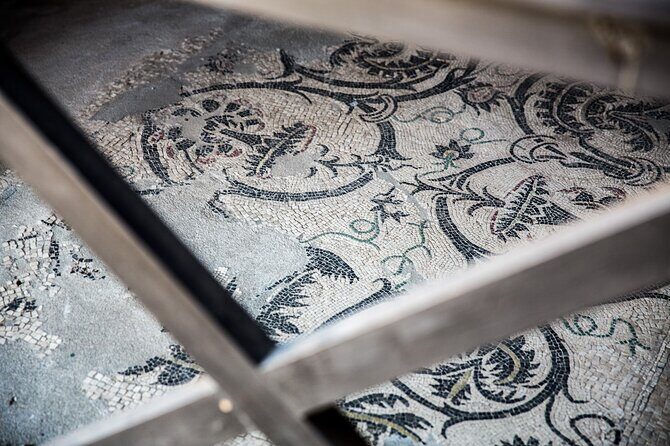 Skip-the-Line Pompeii Guided Tour from Naples - Via dell’Abbondanza: the main street walk with shops, noise, and movement
